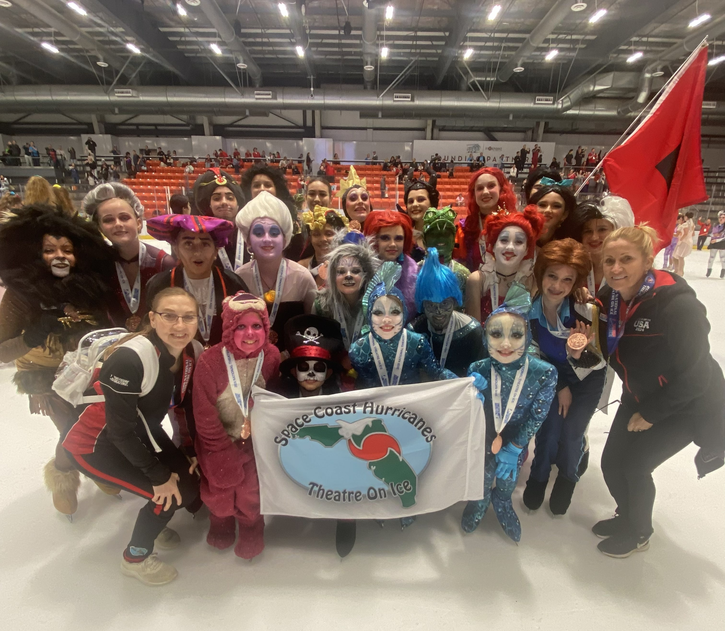 Figure skating group in St. Patricks Day green costumes