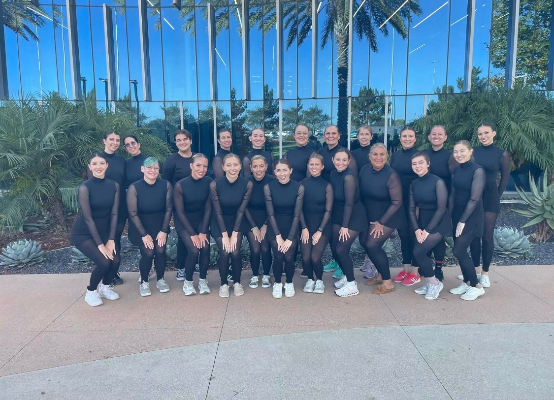 Figure skating group in skeleton Halloween costumes